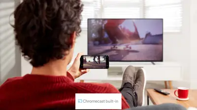 Person casting video from a phone to a living room TV