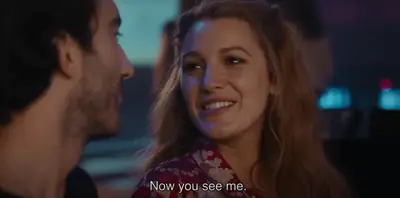 Movie scene playing with English subtitles visible at the bottom